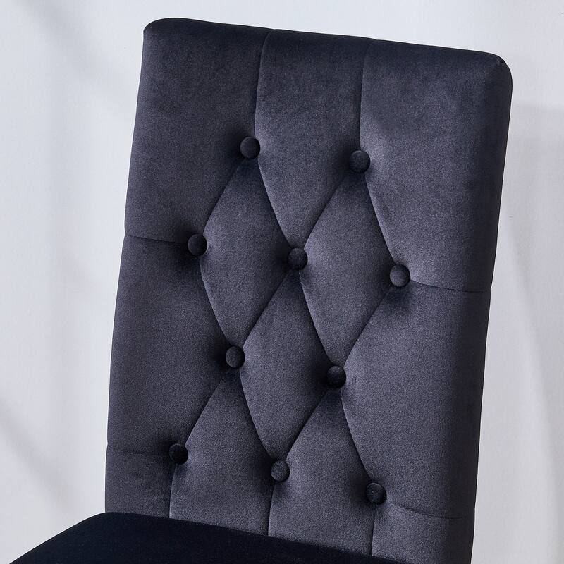 2 piece dining chairs.The gold metal legs complement the black velvet,showcasing a perfect blend