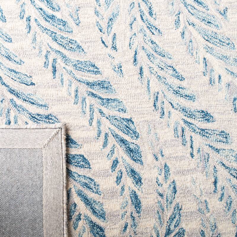 SAFAVIEH Handmade Micro-Loop Maele Modern Wool Rug
