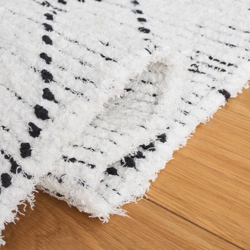 SAFAVIEH Handmade Casablanca Kjellaug Boho Cotton Fringe Rug