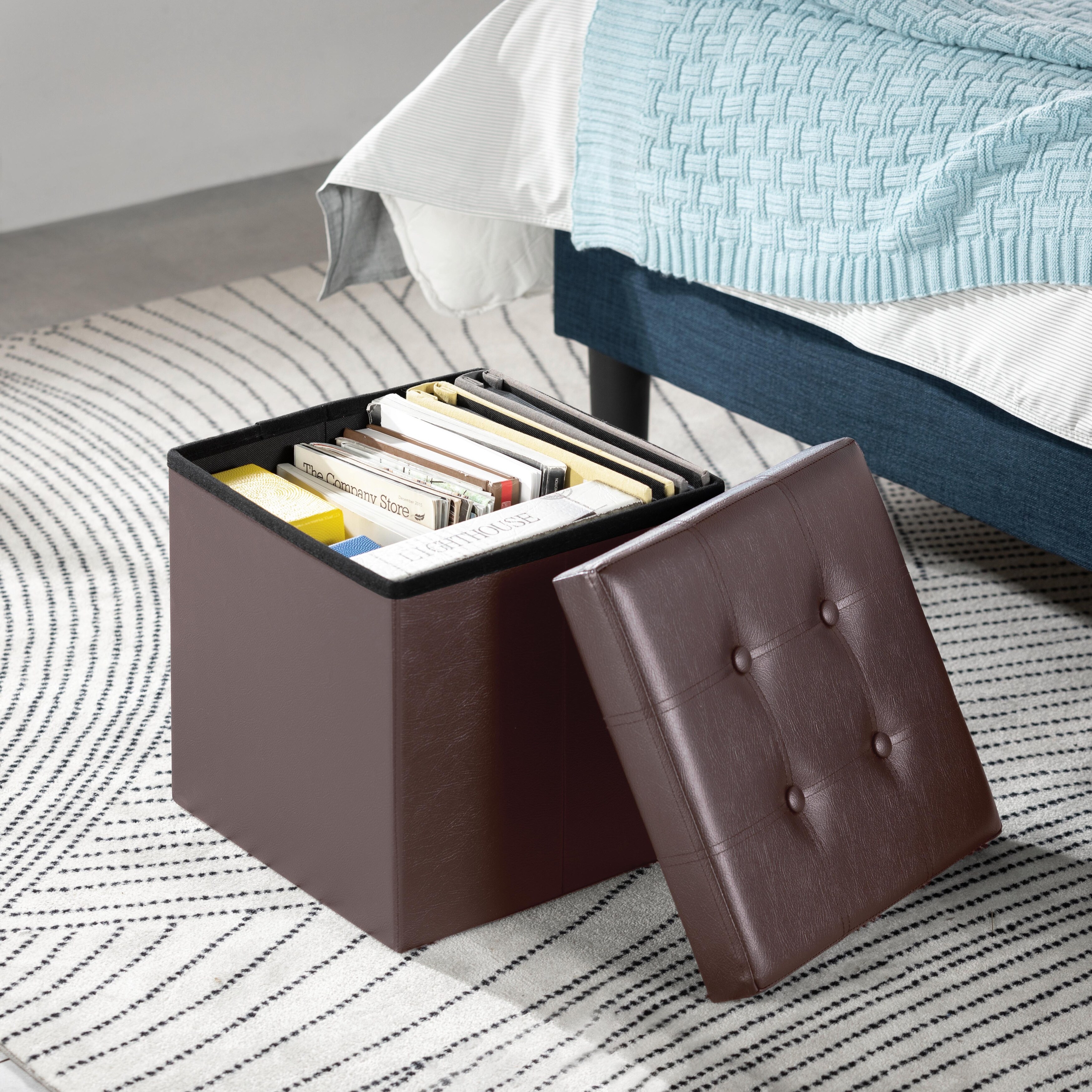 https://ak1.ostkcdn.com/images/products/is/images/direct/393ec5534bf3e65006f6357eb1ceb221abe8fbf7/15-Inch-Button-Tufted-Faux-Leather-Collapsible-Storage-Ottoman-By-Crown-Comfort.jpg