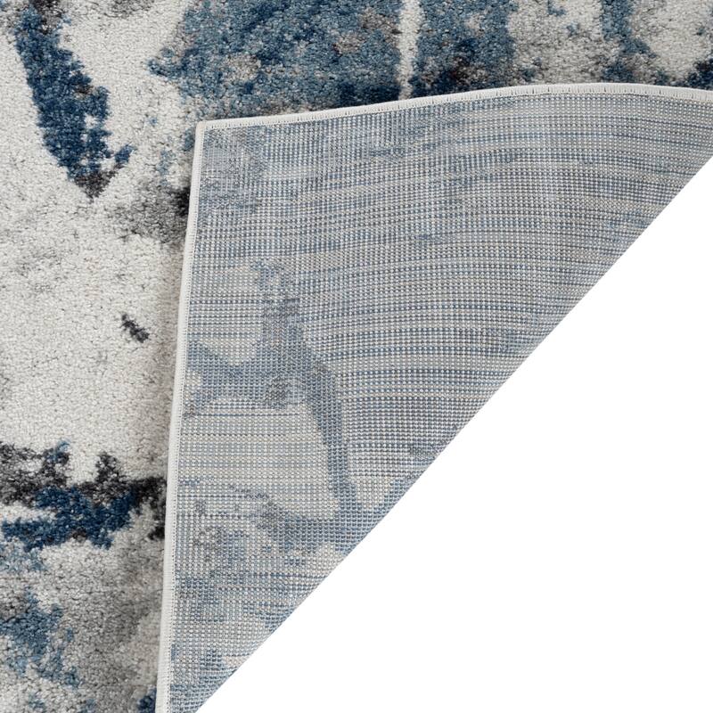 Avant Ivory and Blue Abstract Power-Loom Area Rug 2' x 3'