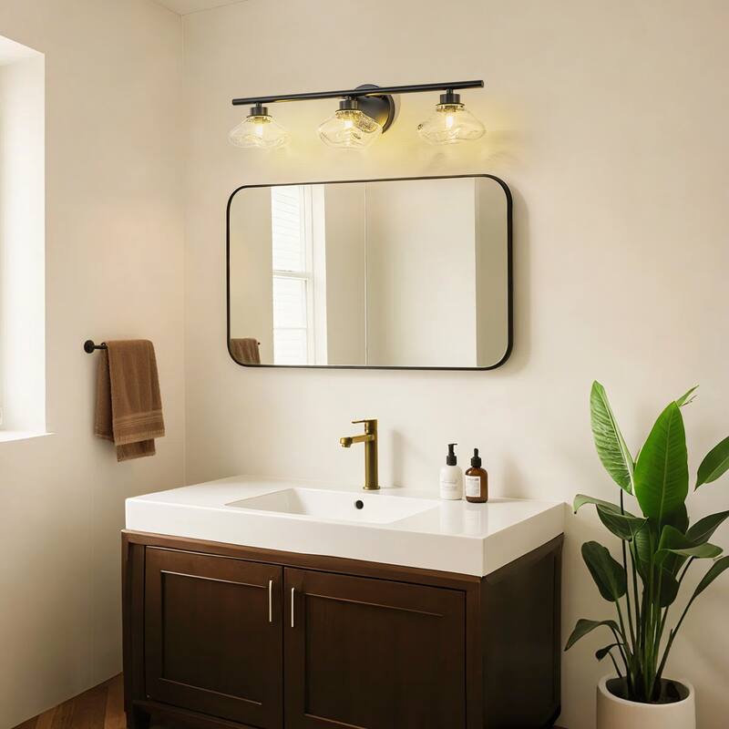 3-Light 24.4" Modern Black/Gold Bathroom Vanity Light with Stone-Shaped Seed Glass Shades