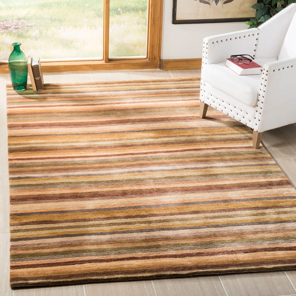 SAFAVIEH Couture Hand-knotted Tibetan Soledade Modern Wool Rug with