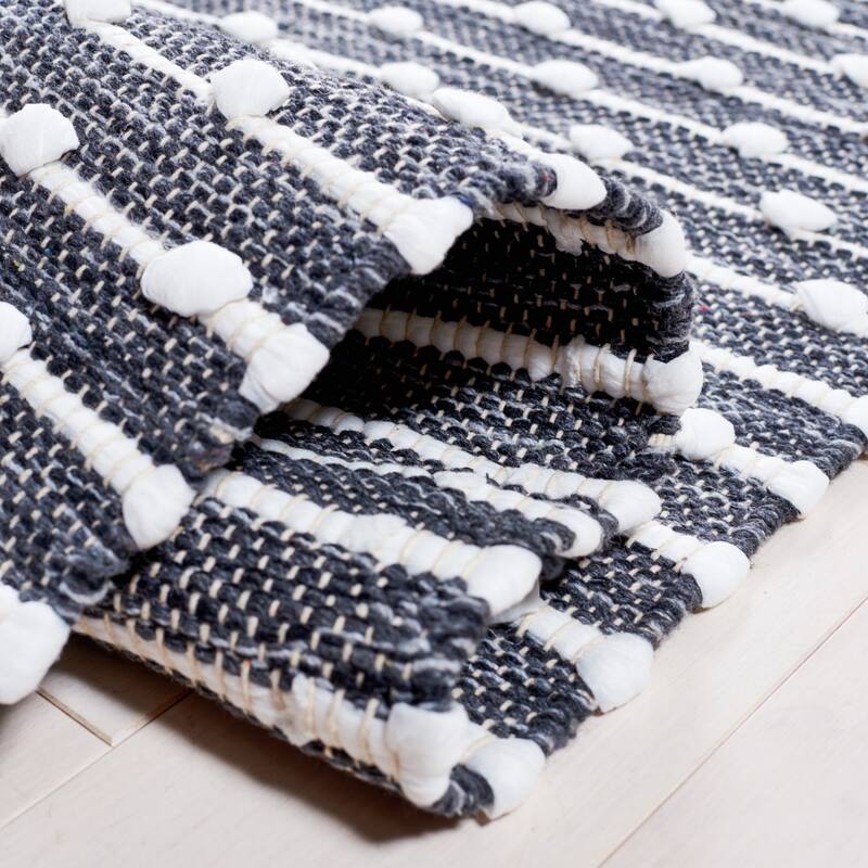 SAFAVIEH Handmade Montauk Millie Casual Rug