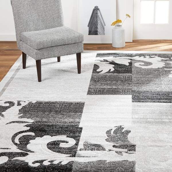 https://ak1.ostkcdn.com/images/products/is/images/direct/398b607d83cdea75120783fe5290c9b56bcd2f10/Home-Dynamix-Catalina-Pierre-Contemporary-Geometric-Area-Rug.jpg?impolicy=medium