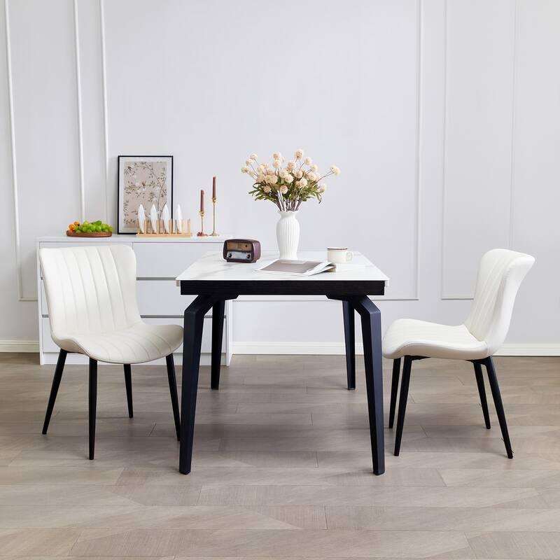 Pair of Cream White Mid-Century Modern Dining Chairs with Faux Leather Upholstery‌
