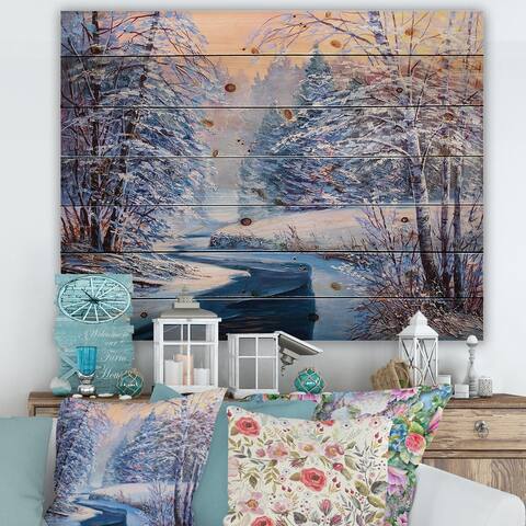 Designart 'Pastel Christmas Forest With River' Lake House Print on Natural Pine Wood