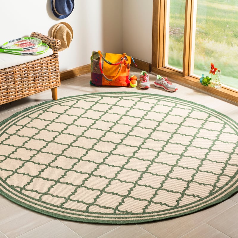 SAFAVIEH Linden Carolynn Indoor/ Outdoor Patio Backyard Rug - 6'7" Round - Cream/Green