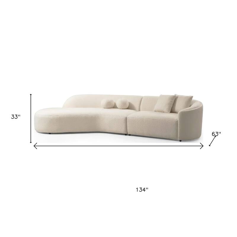 HomeRoots Ivory Boucle Modular Curved Two Piece Sofa and Chaise Sectional With Toss Pillows