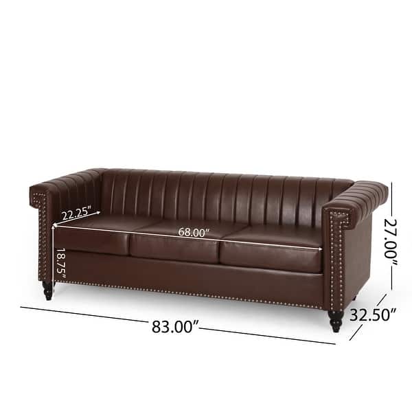 dimension image slide 2 of 4, Drury Channel Stitch Faux Leather Sofa with Nailhead Trim by Christopher Knight Home - 83.00" L x 32.50" W x 27.00" H