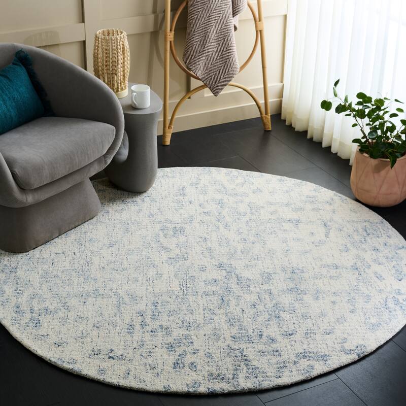 SAFAVIEH Handmade Ebony Kelly Wool Rug - 6' Round - Ivory/Blue