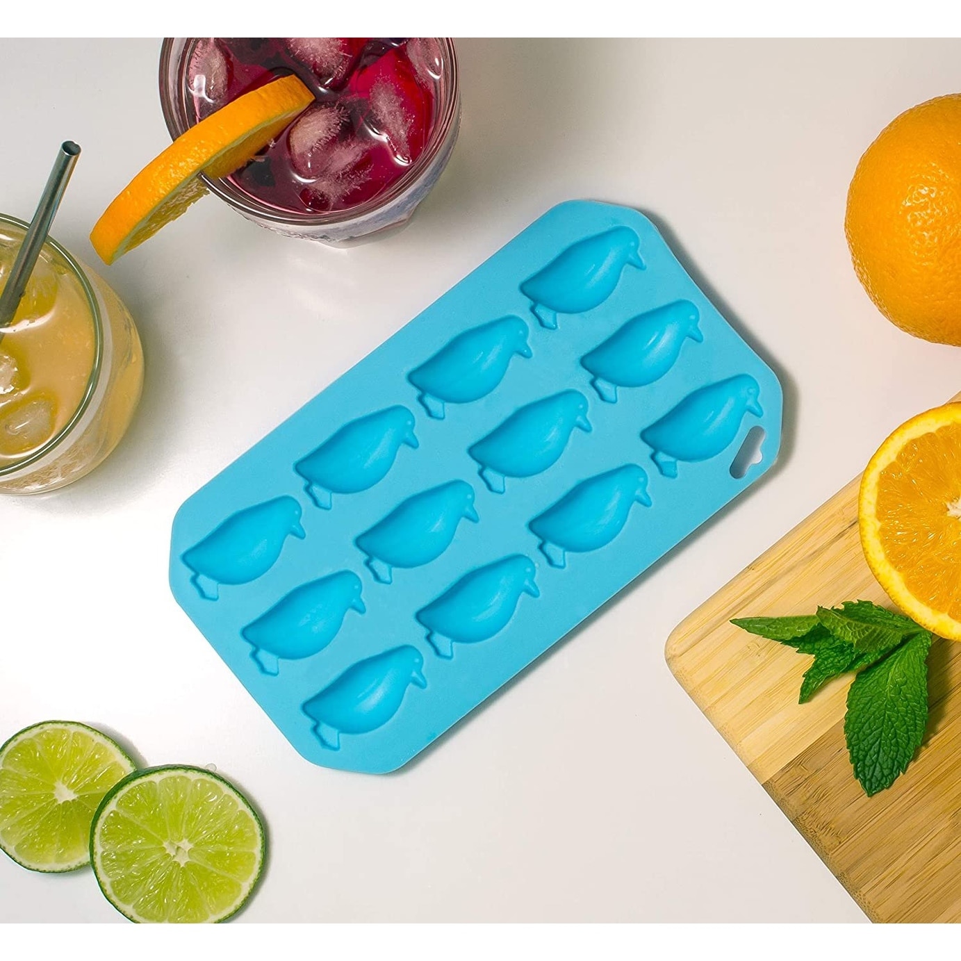 https://ak1.ostkcdn.com/images/products/is/images/direct/3a55f5fc3c110bc1a93691bc916f5d7ee532567a/HIC-Blue-Silicone-Penguin-Shape-Ice-Cube-Tray-and-Baking-Mold---Makes-12-Cubes.jpg