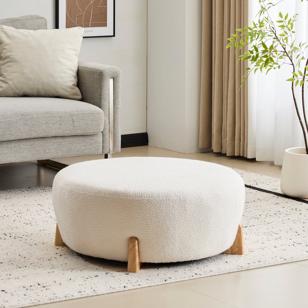Modish White Round Boucle Ottoman with Splayed Rubber Wood Legs