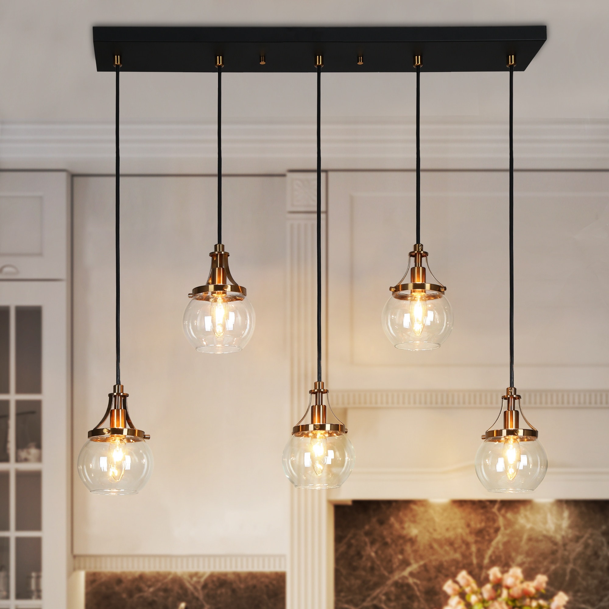 Transitional 5 Light Black and Brass Linear Cluster Chandelier for Kitchen Island with Clear Globe Glass Shade