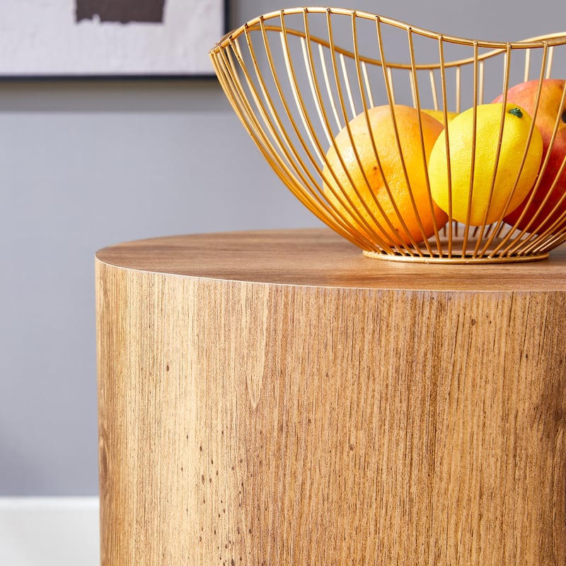 The cylindrical table with its patterned design can be easily integrated into a variety of interior styles, small dining tables
