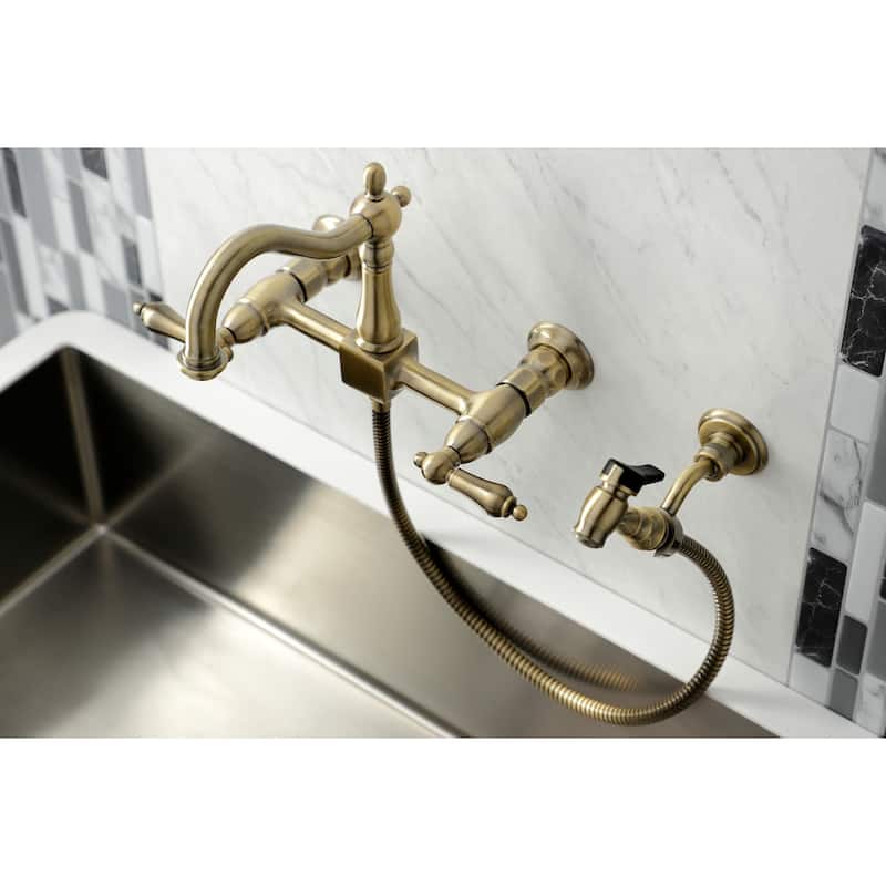 Kingston Brass Heritage Wall Mount Bridge Kitchen Faucet with Brass Sprayer