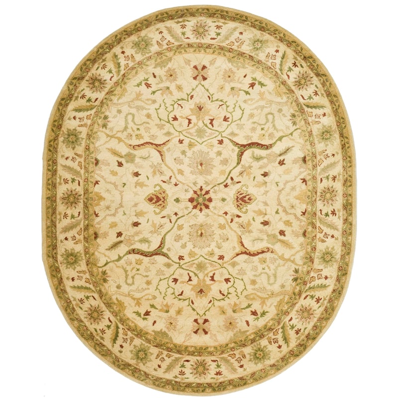 SAFAVIEH Handmade Antiquity Loana Traditional Oriental Wool Rug - 7'6" x 9'6" Oval - Ivory