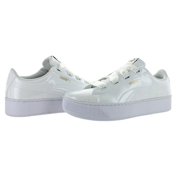 white low top pumas