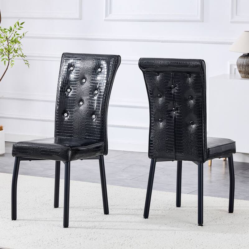 A set of 2 vintage crocodile leather cushioned dining chairs, featuring crystal clasp design and artificial leather design