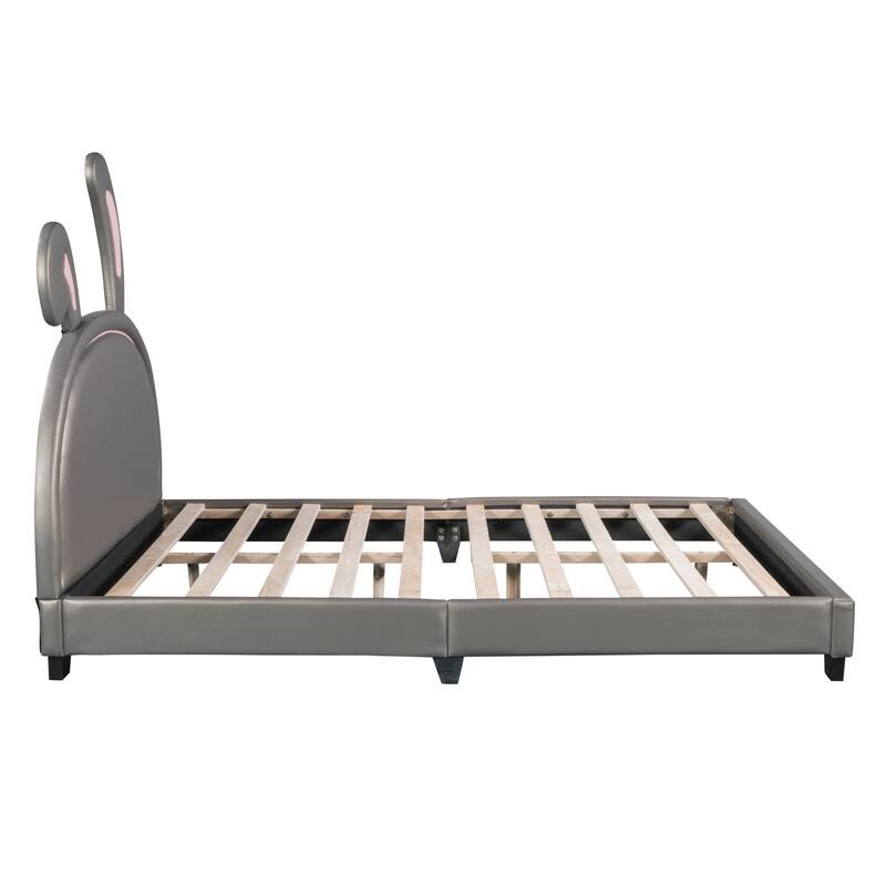 Upholstered faux leather platform bed