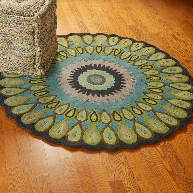 Sevita Bursting Peacock Wool Area Rug