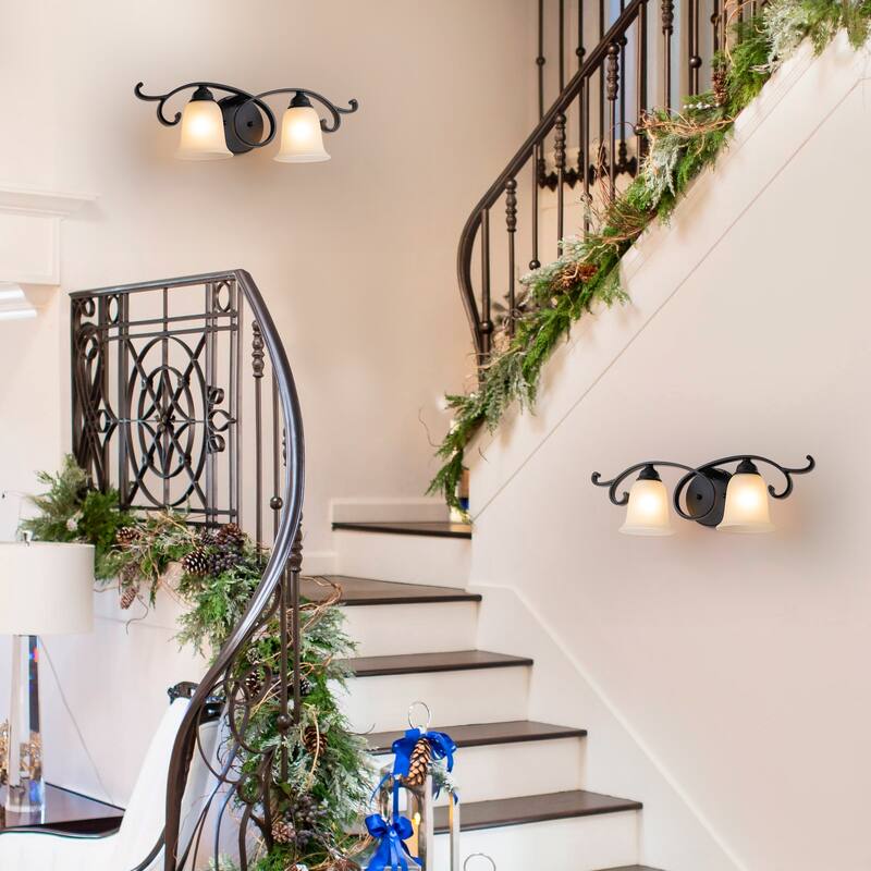 2-Light Black Scrollwork Metal Wall Sconce Frosted Bell Shade