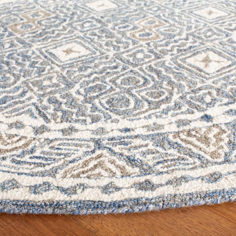 SAFAVIEH Handmade Micro-Loop Jelske Wool Rug