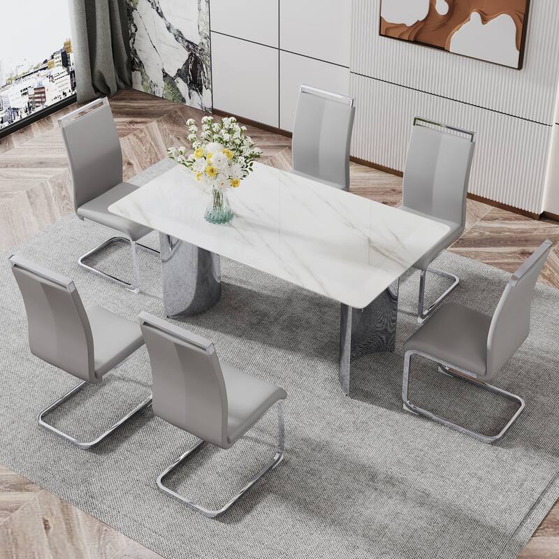 Modern minimalist dining table. White imitation marble glass sticker desktop, stainless steel legs