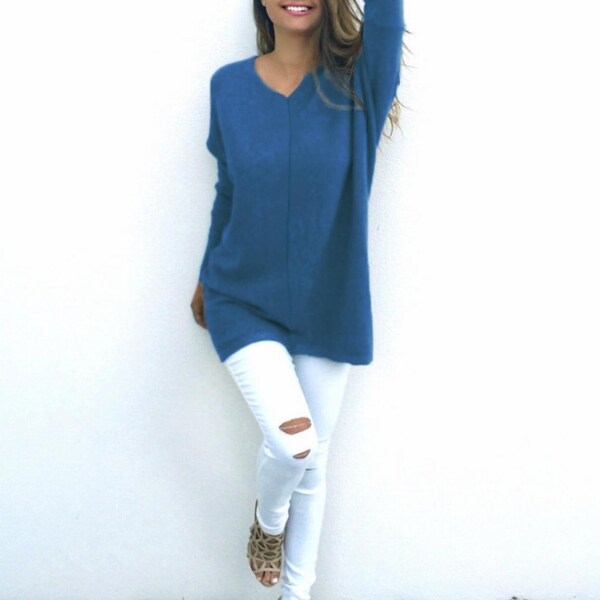 Stylish Loose-Fit Sweater Is Perfect For Keeping Warm. Opens flyout.
