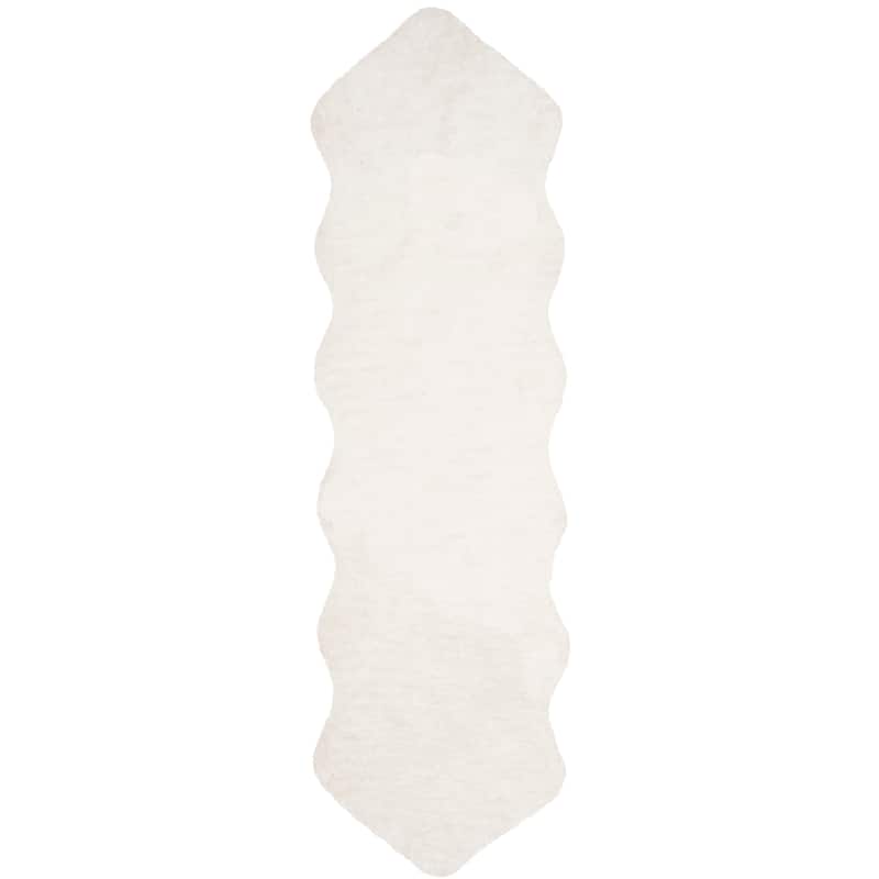 SAFAVIEH Handmade Sheep Shag Nurhayat Solid Rug