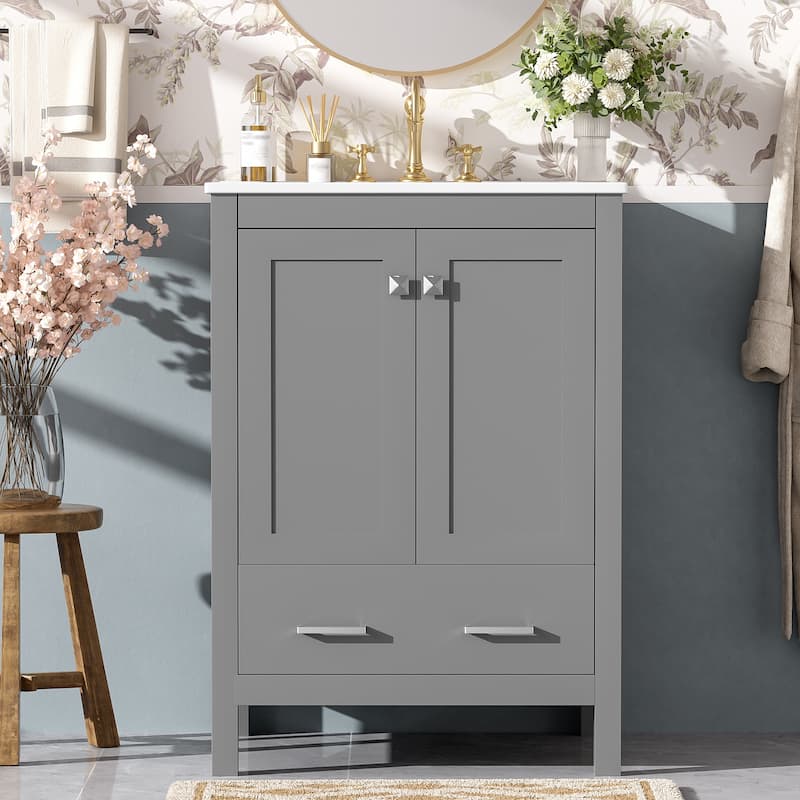 24-inch bathroom vanity with integrated undermount basin and a storage cabinet featuring 2 doors and 1 drawer.