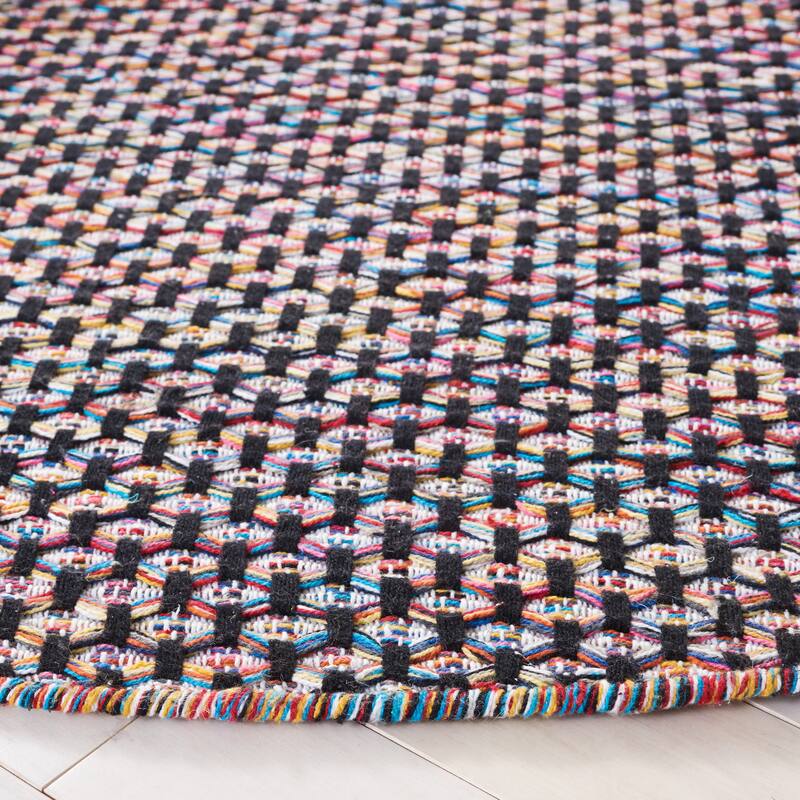 SAFAVIEH Handmade Montauk Wakely Casual Rug
