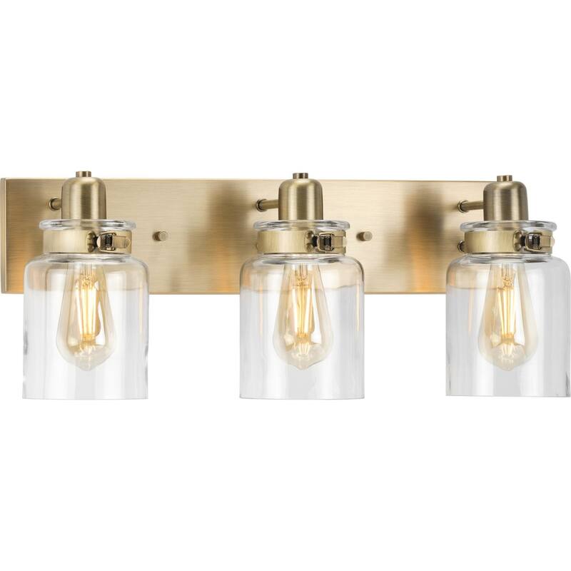 Calhoun Collection Three-Light Vintage Brass Clear Glass Farmhouse Bath Vanity Light - 21.625 in x 6.875 in x 8.625 in