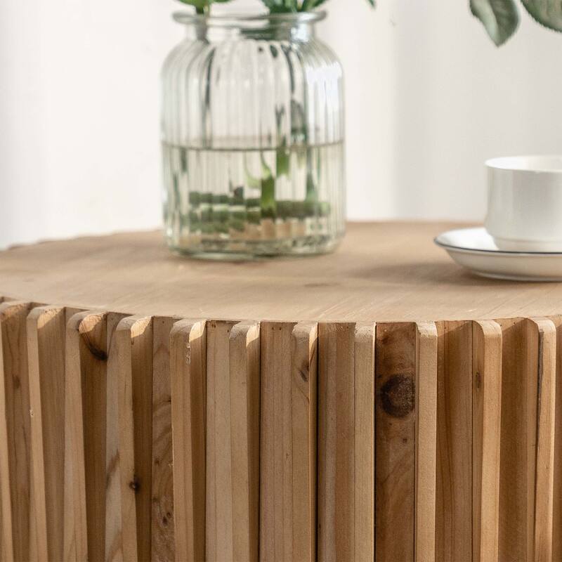 Cylindrical Coffee Table with Vertical Texture Relief Design