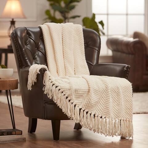 beige colored chanasya textured knit throw blanket with tassels