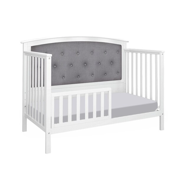 grey tufted crib