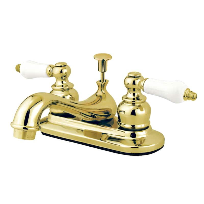 Kingston Brass Restoration Polished Brass 4-inch Center Bathroom Faucet - White Lever