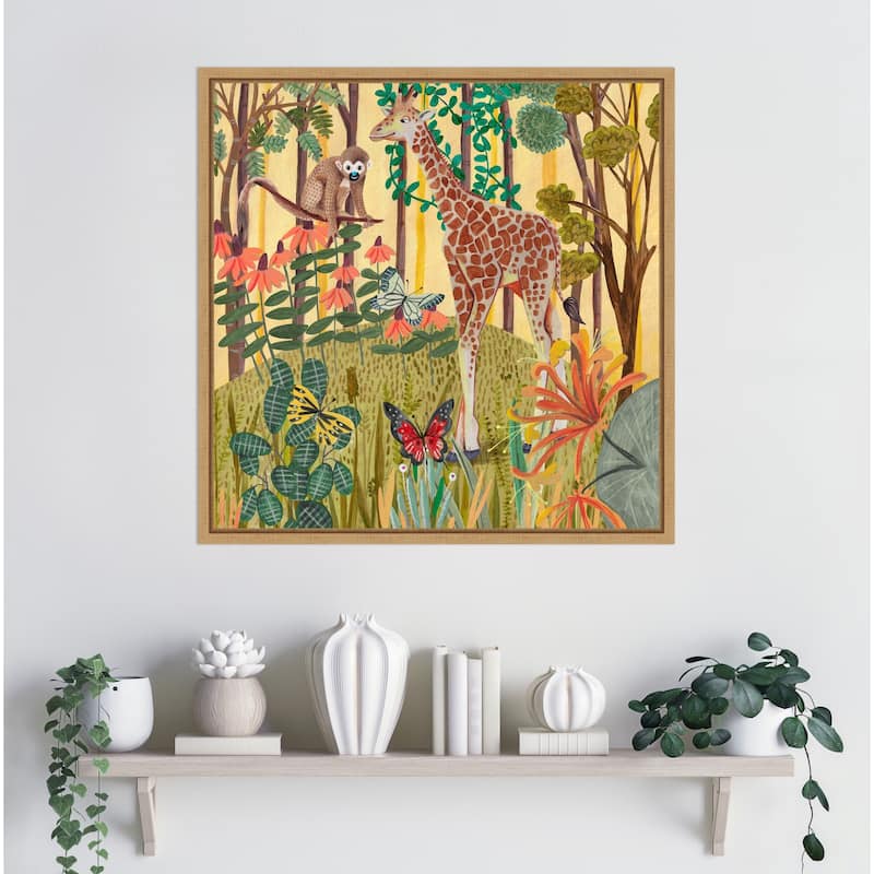 Giraffe in nature by Caroline Bonne Muller Framed Canvas Wall Art