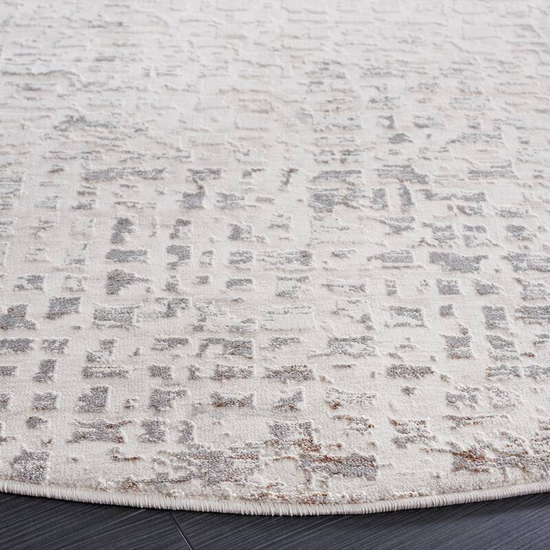SAFAVIEH Diamond Linde Modern Abstract Fringe Rug