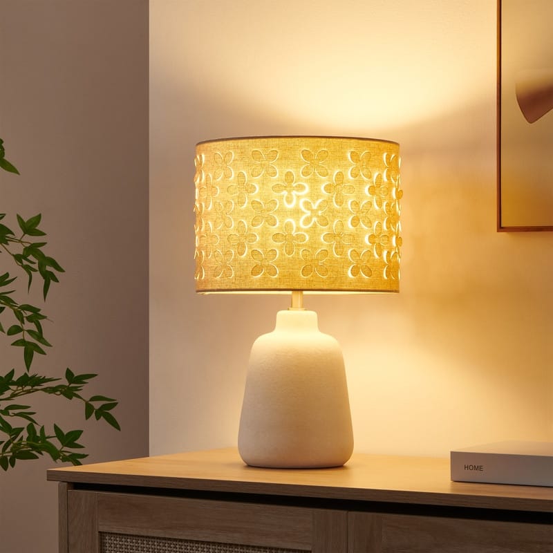 KAWOTI Modern White Ceramic Table Lamp with Floral Cutting Shade - W11" x H17.25"