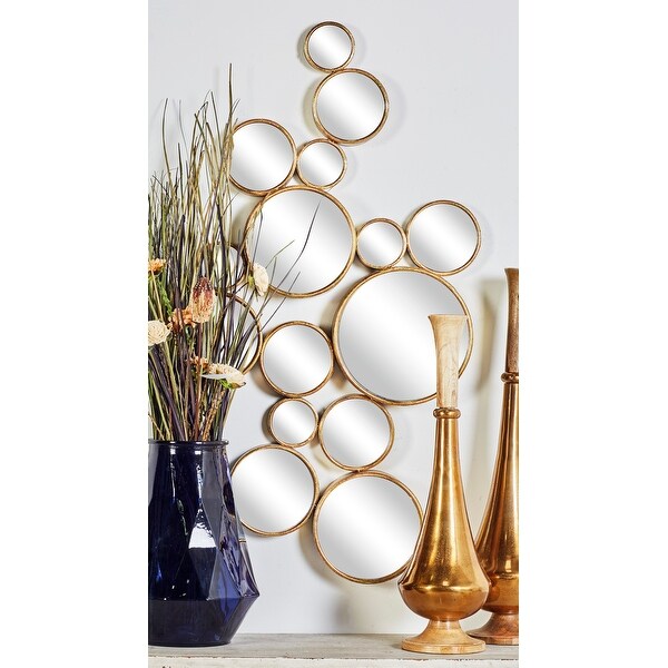 Strick & Bolton Buri Round Gold Wall Mirrors. Opens flyout.