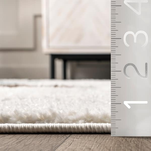 dimension image slide 0 of 2, Nuloom Zende Colorful Stones Kids Tassel Area Rug