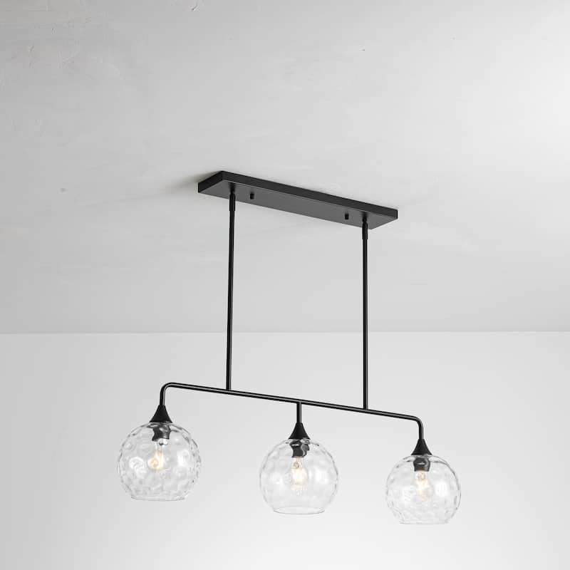 3-Light Modern Black/Brushed Gold Linear Chandelier for Kitchen Island with Clear Textured Glass Globe Shades