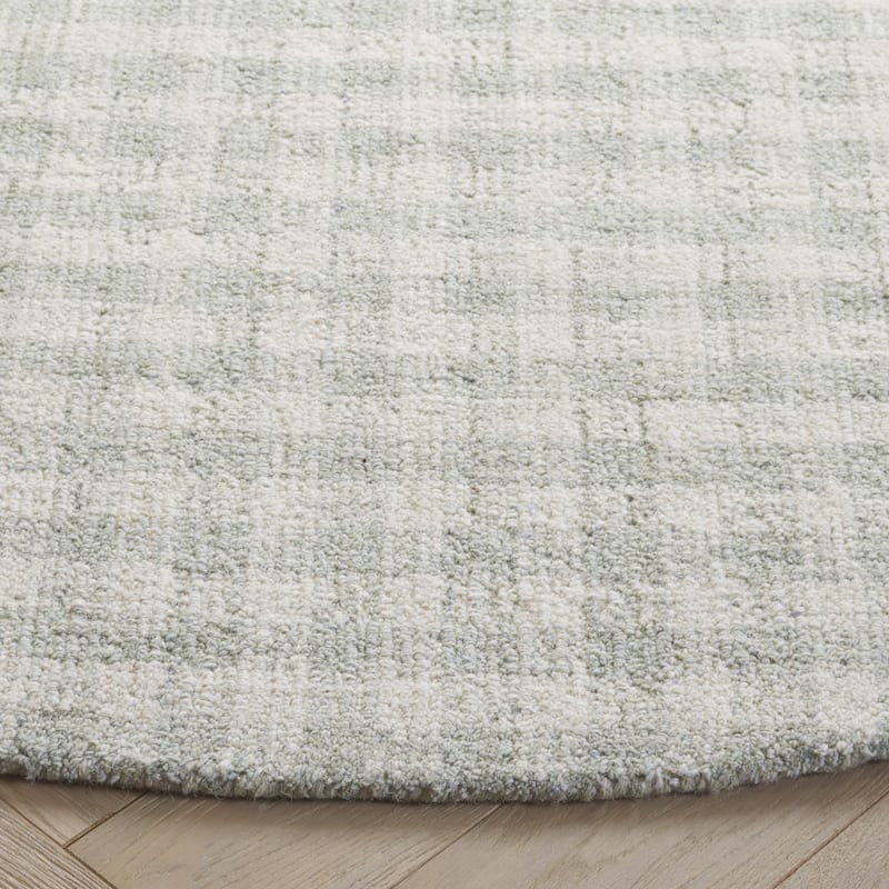 SAFAVIEH Handmade Ebony Katarin Contemporary Wool Rug