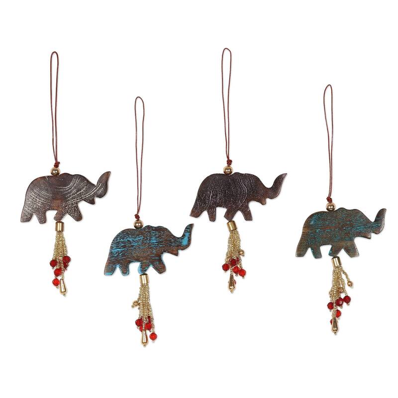 NOVICA Elephant Celebration, Wood ornaments (set of 4) - Each: 1.8" H x 3" W x 0.3" D
