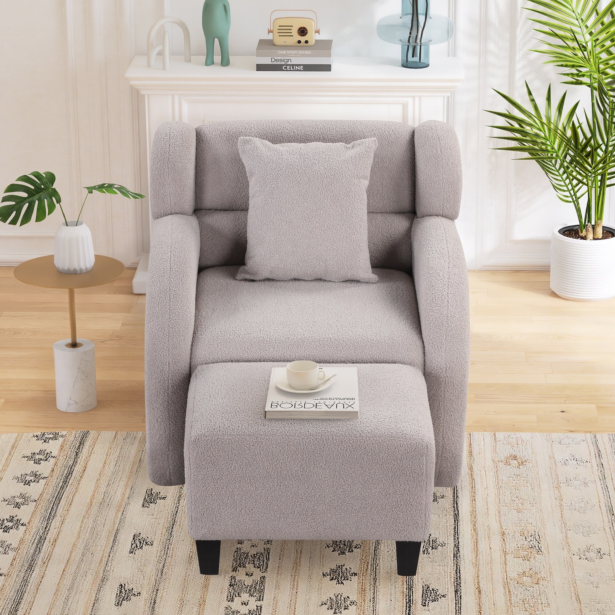 Grey velvet armchair and footstool sales
