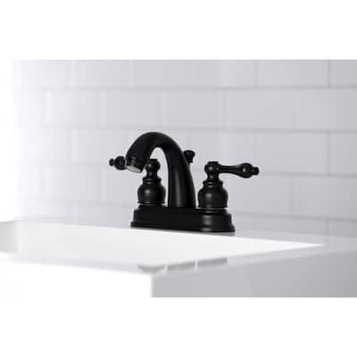 Kingston Brass Restoration Two-Handle 3-Hole Deck Mount 4 in. Centerset Bathroom Faucet