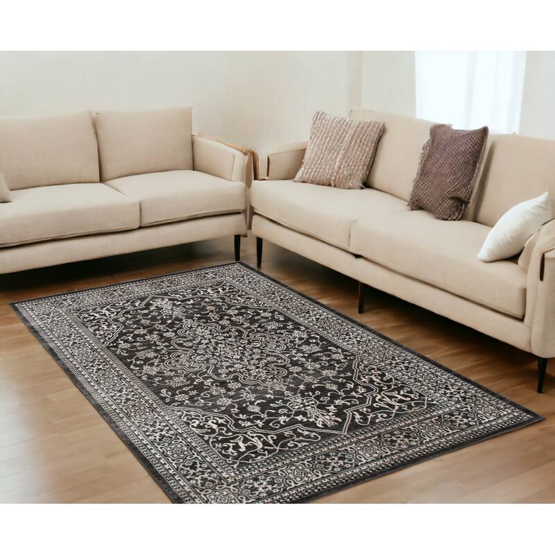 Guyis Distressed Stain Resistant Woven Area Rug By HomeRoots - 91' X '63' X '0.4 - Black and Ivory - Rectangle