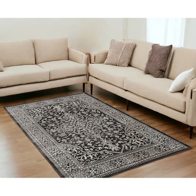 Guyis Distressed Stain Resistant Woven Area Rug By HomeRoots