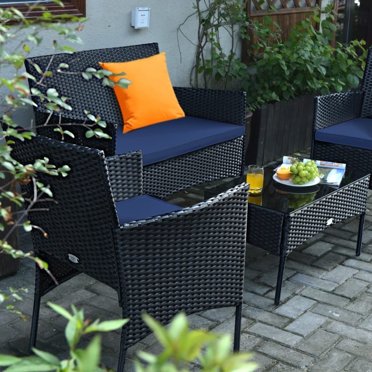 4 Pieces Patio Rattan Cushioned Sofa Set with Tempered Glass Coffee Table - 24" x 23.5" x 33" (L x W x H)